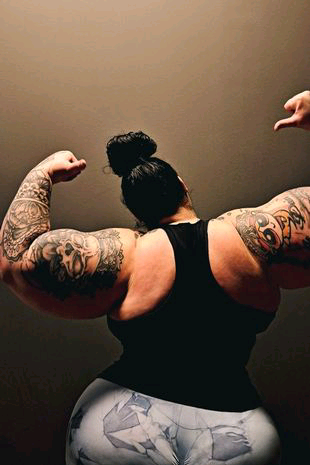 Woman with bigger biceps than Arnie Schwarzenegger faces down her hateful trolls